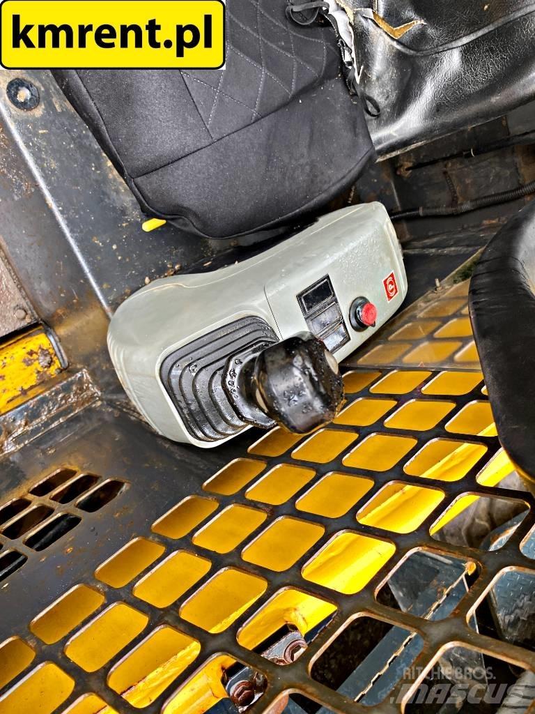 Komatsu SK 815 Carregadoras de direcção deslizante