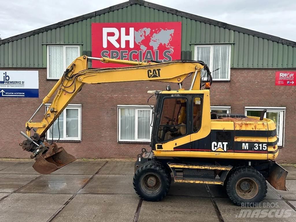 CAT M315 +ROTO CE Escavadoras de rodas