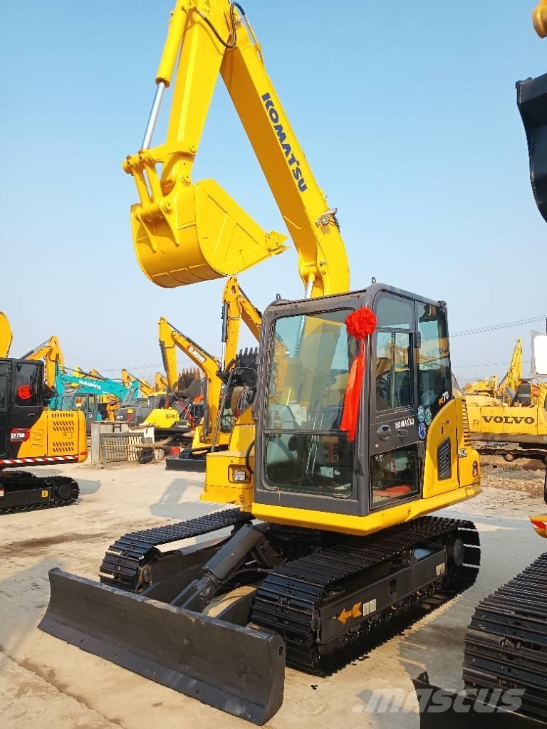 Komatsu PC 70 Escavadoras Midi 7t - 12t
