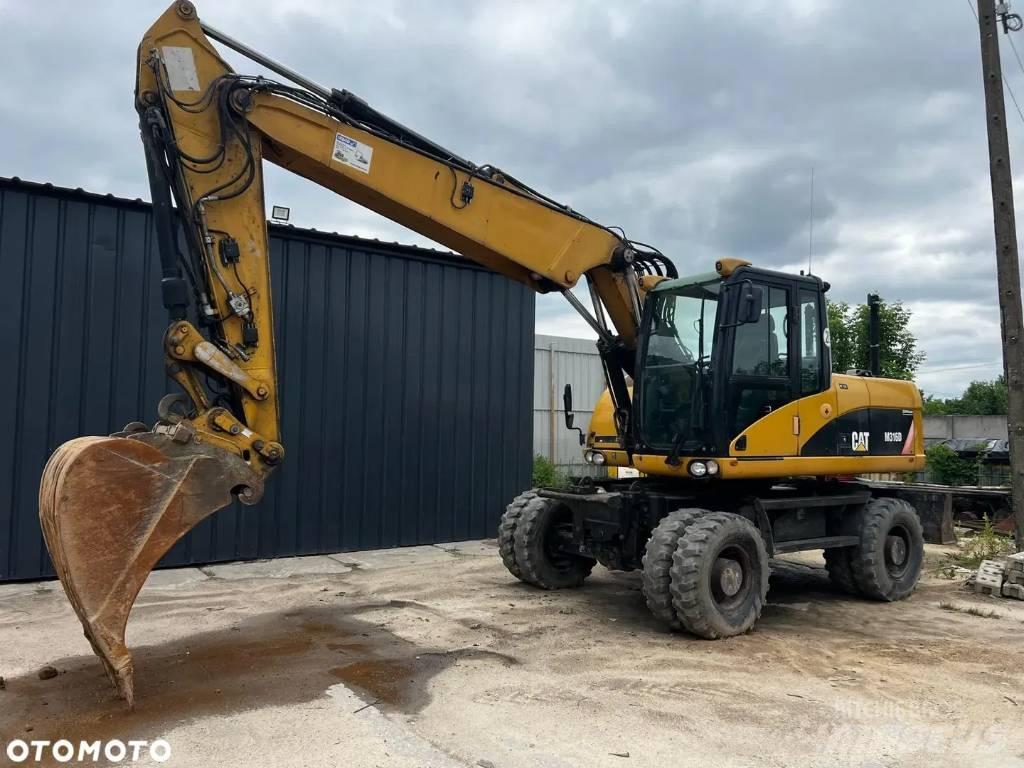 CAT M 316 D Escavadoras de rodas