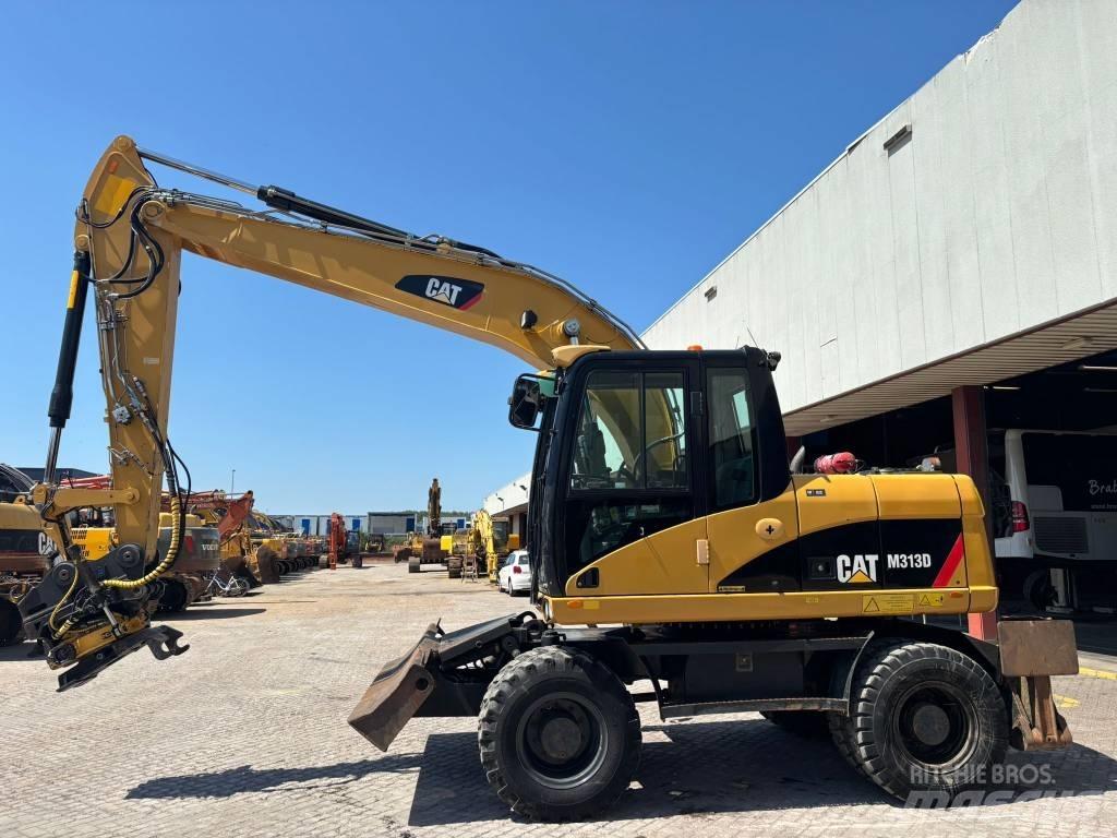 CAT M 313 D Escavadoras de rodas