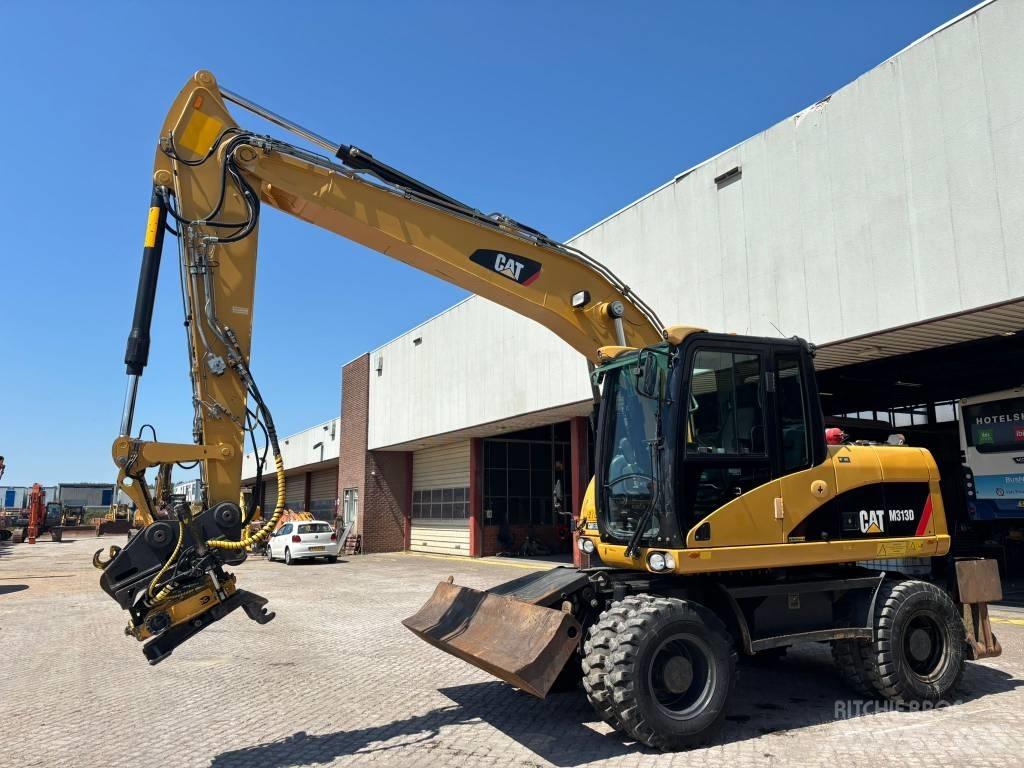 CAT M 313 D Escavadoras de rodas