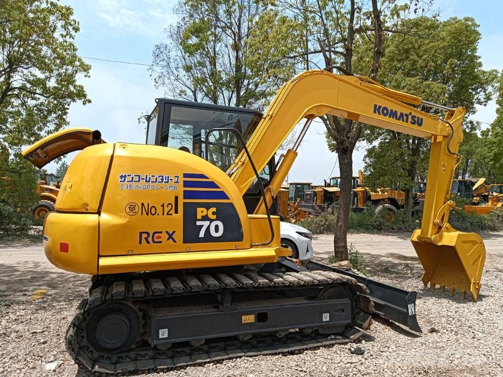 Komatsu PC 70 Escavadoras Midi 7t - 12t