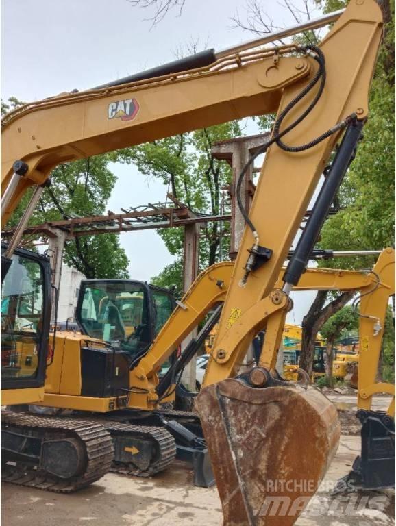 CAT 310 Escavadoras de rastos