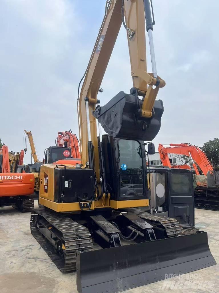 CAT 310 Escavadoras de rastos