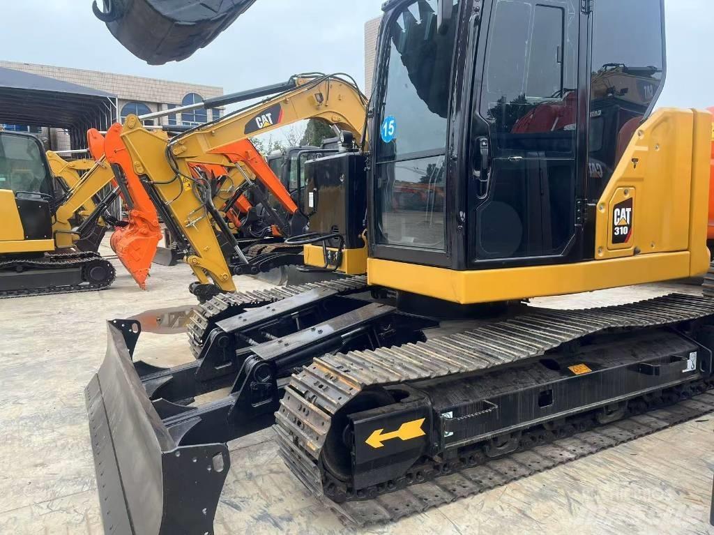 CAT 310 Escavadoras de rastos