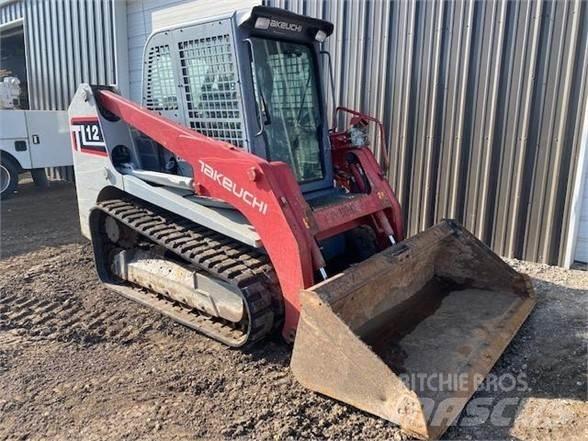 Takeuchi TL12 Carregadoras de direcção deslizante
