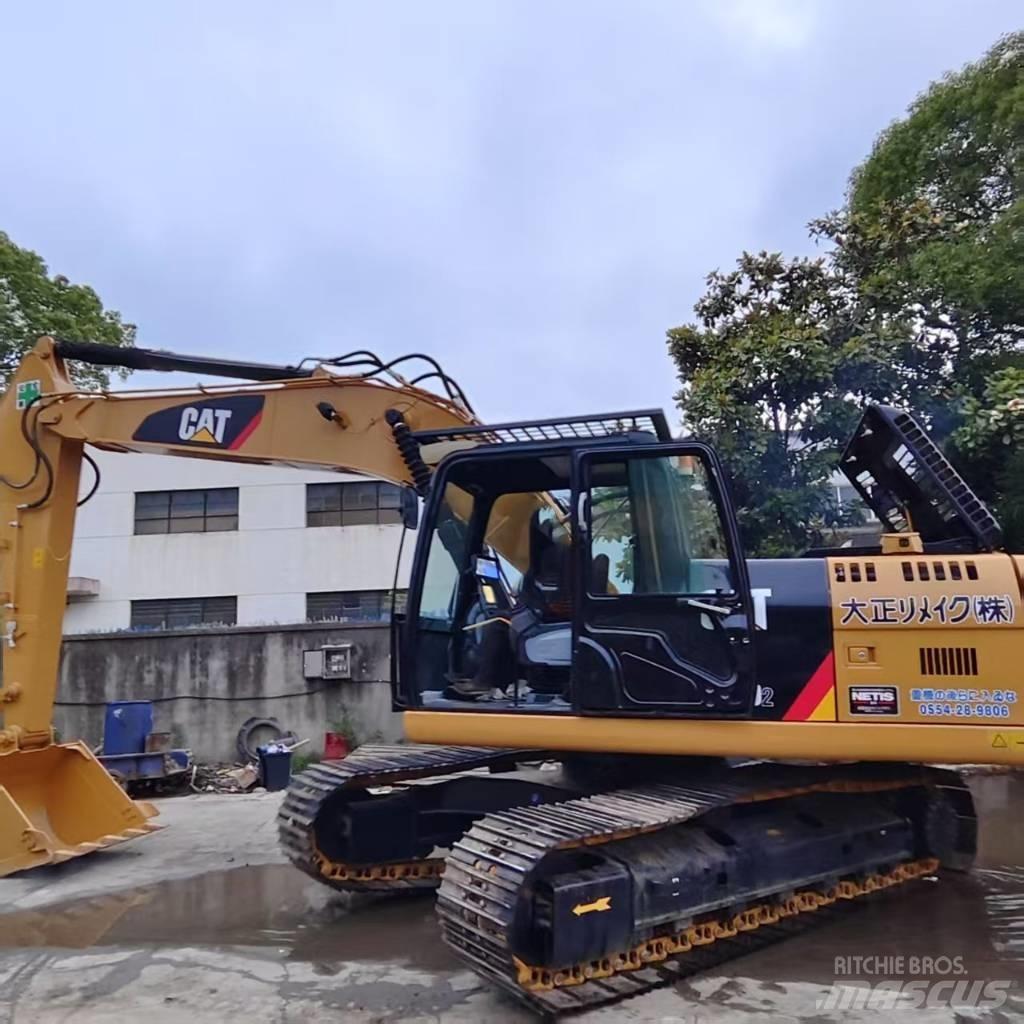 CAT 320 Escavadoras de rastos