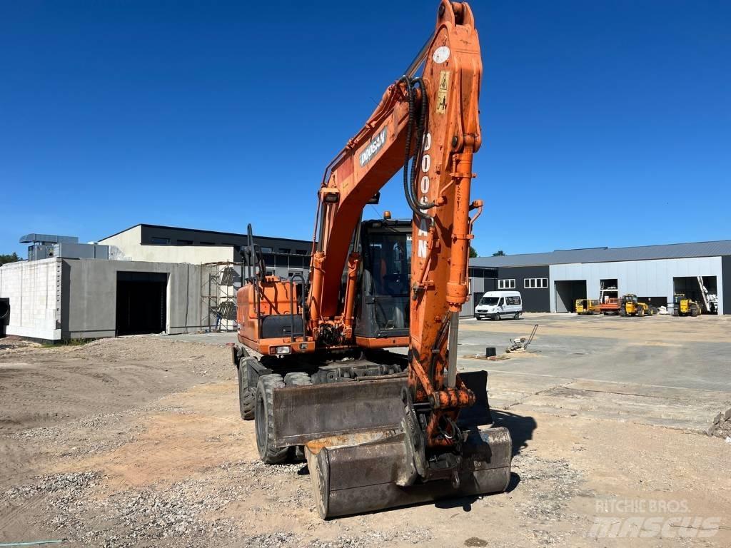 Doosan DX 140 W Escavadoras de rodas