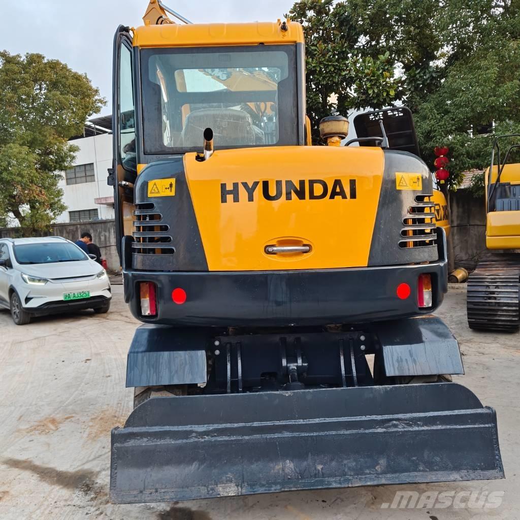 Hyundai 60 W VS Escavadoras de rodas