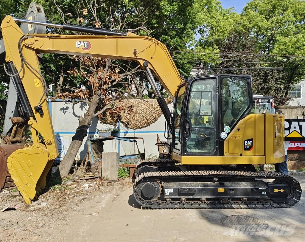 CAT 310 Escavadoras de rastos