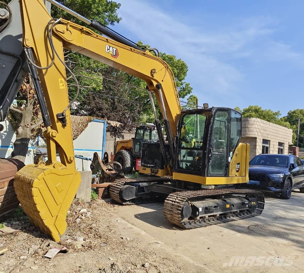 CAT 310 Escavadoras de rastos