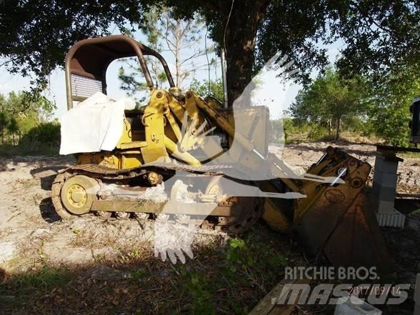 John Deere 450 Pás Carregadoras de rastos