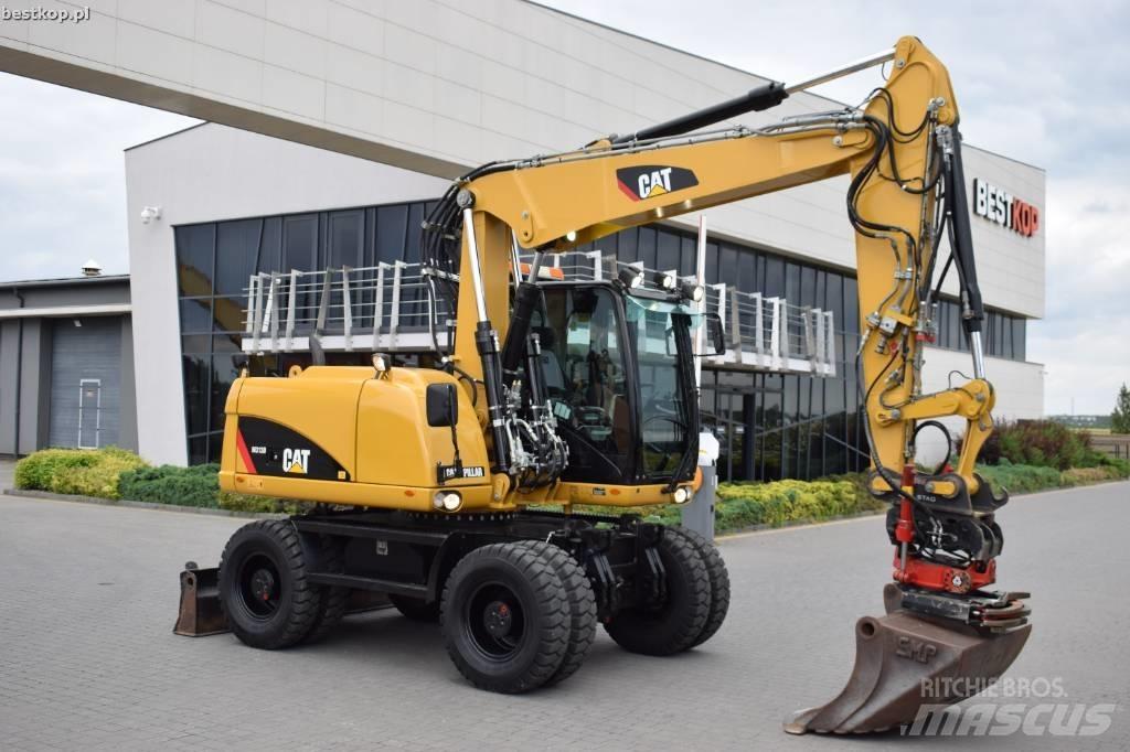 CAT M 313 D Escavadoras de rodas