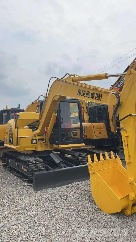 Komatsu PC 70 Escavadoras Midi 7t - 12t