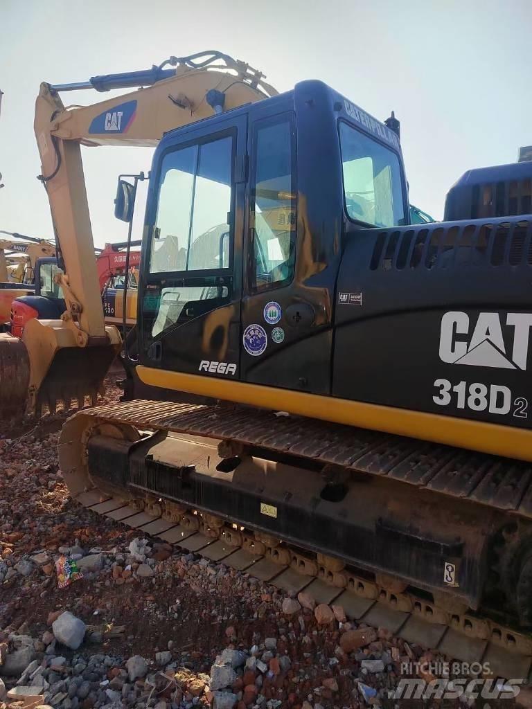 CAT 318 Escavadoras de rastos