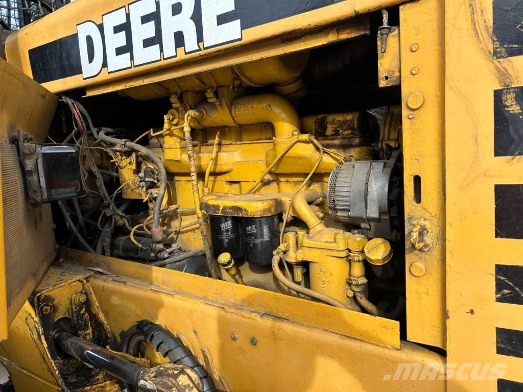 John Deere 640 D Rechegadores