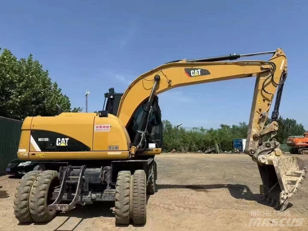 CAT M 315 D Escavadoras de rodas
