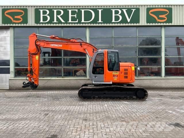 Hitachi ZX 135 US Escavadoras de rastos