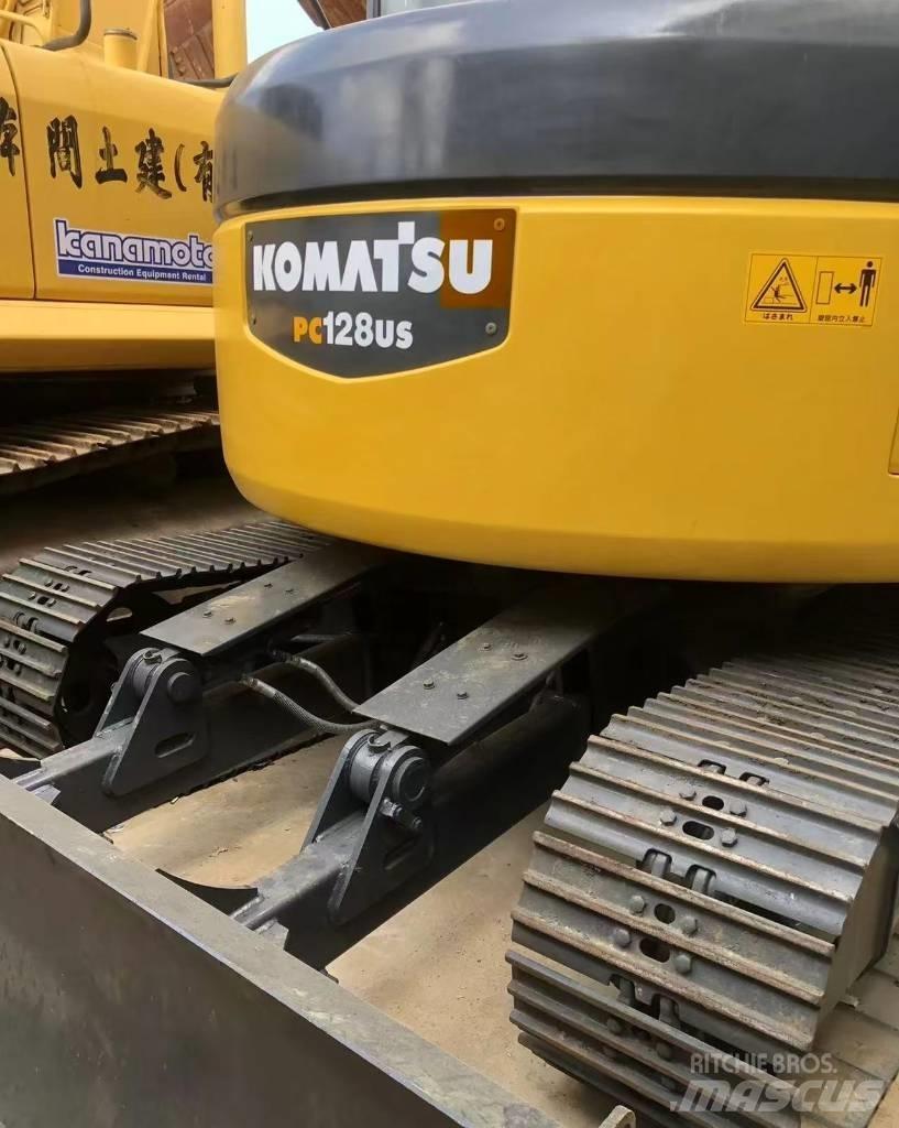 Komatsu 128 US Escavadoras de rastos