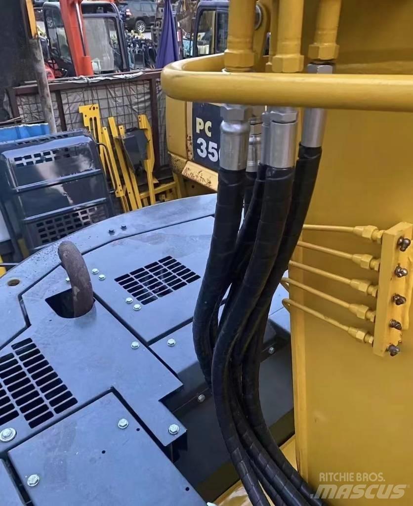 Komatsu 128 US Escavadoras de rastos