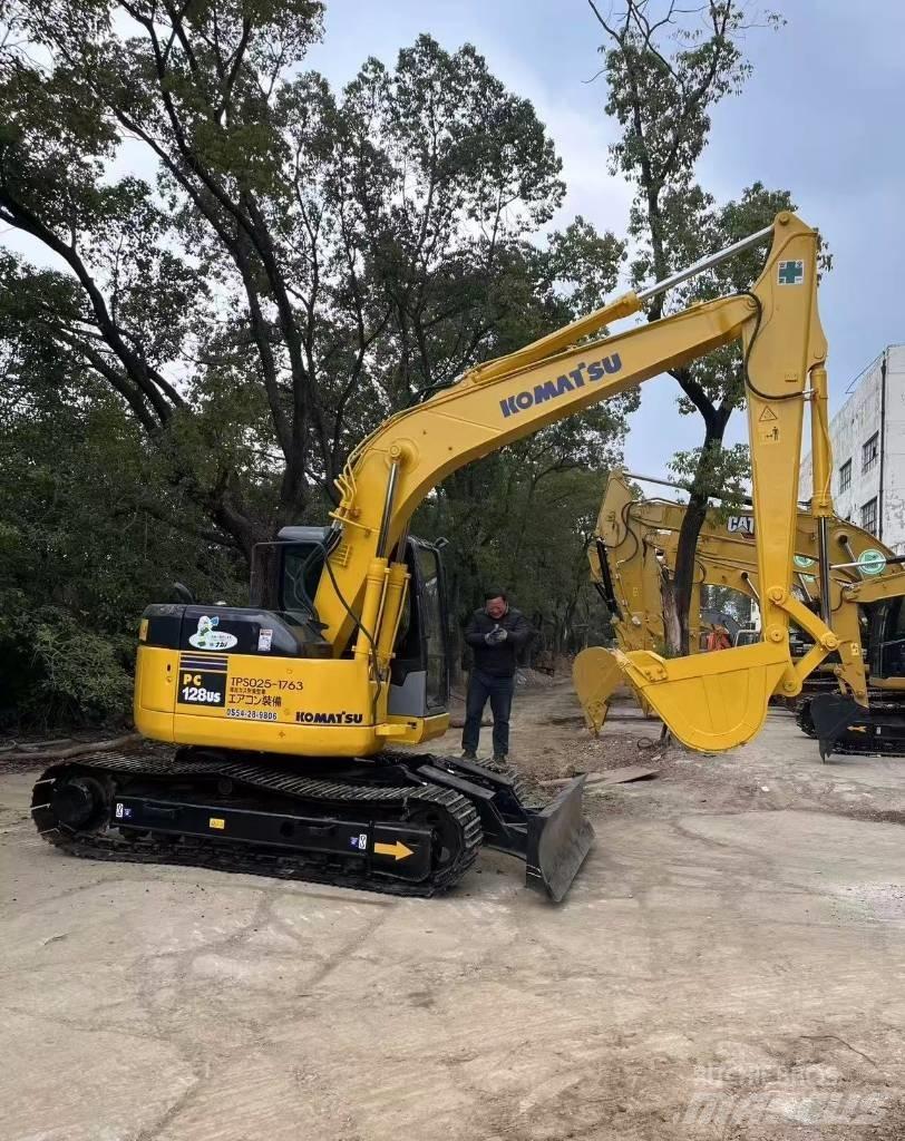 Komatsu 128 US Escavadoras de rastos