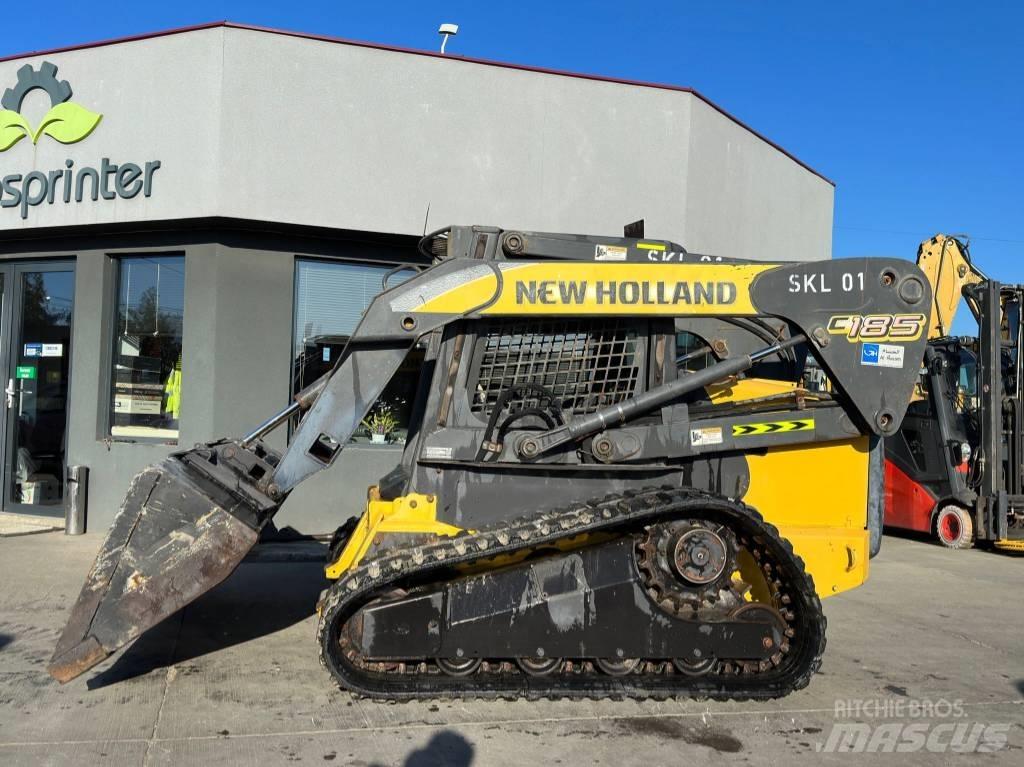 New Holland C 185 Carregadoras de direcção deslizante