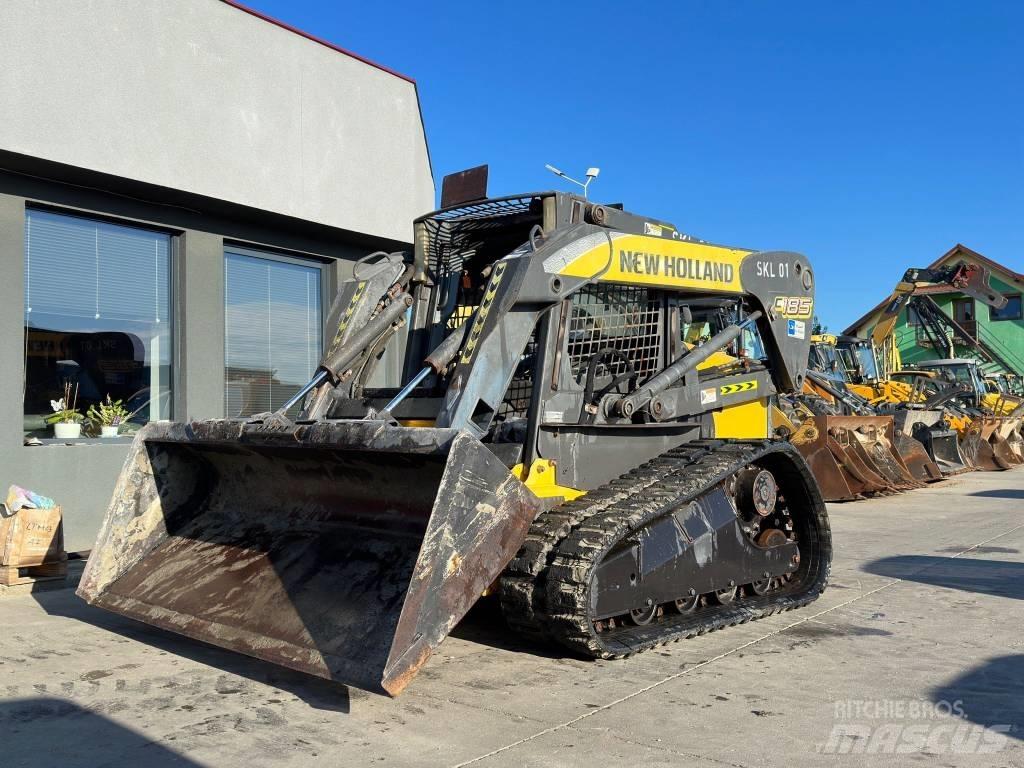 New Holland C 185 Carregadoras de direcção deslizante