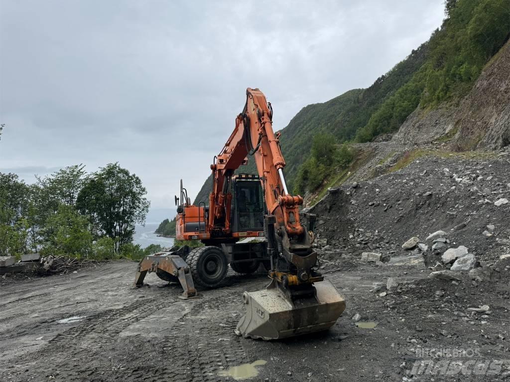 Doosan 140 W Escavadoras de rodas