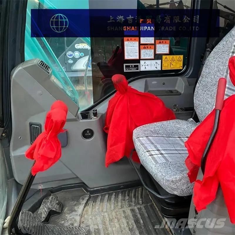 Kobelco 210 Escavadoras de rastos