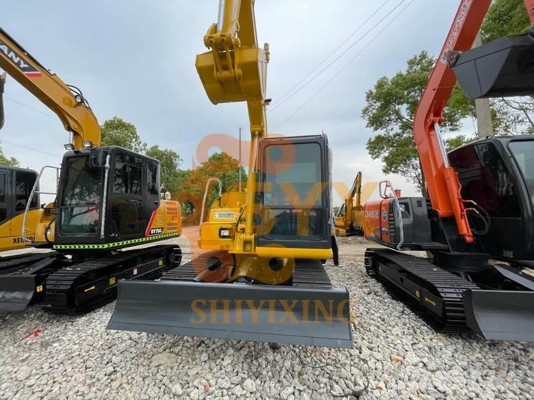 Komatsu PC 70 Escavadoras Midi 7t - 12t