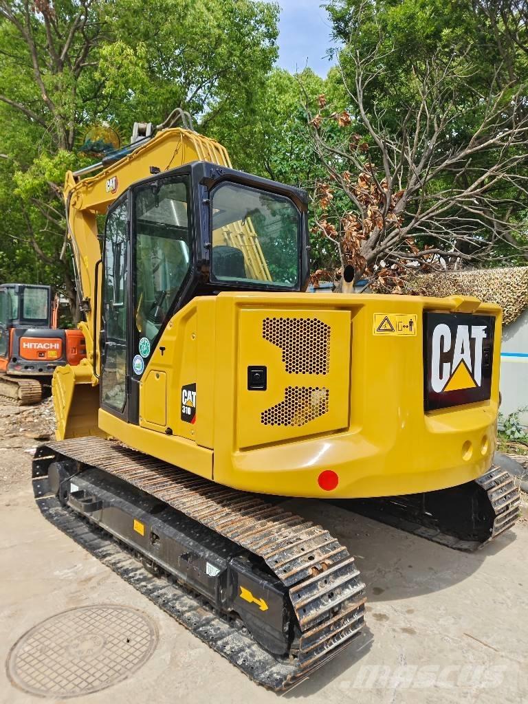 CAT 310 Escavadoras de rastos