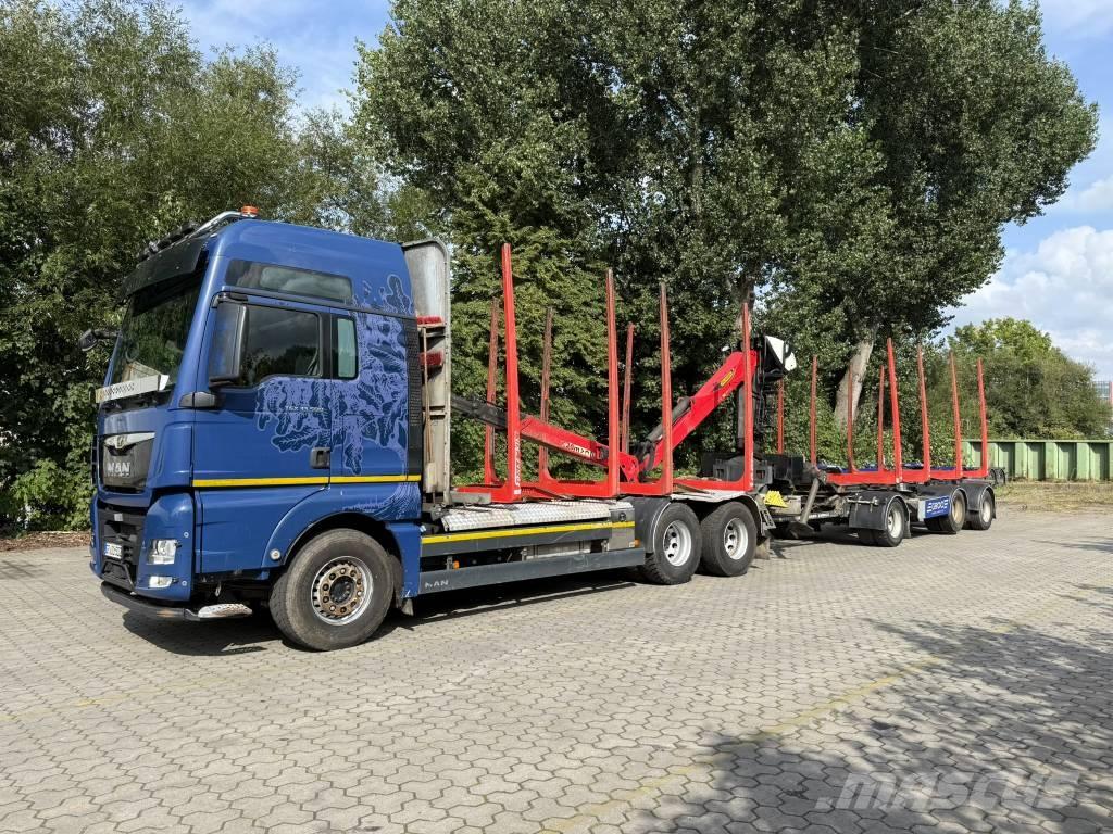 MAN TGX 33.500 Camiões de transporte de máquinas florestais