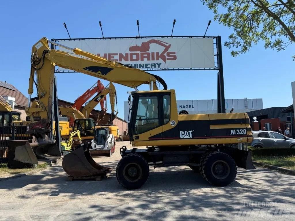 CAT M320 2001 Escavadoras de rodas