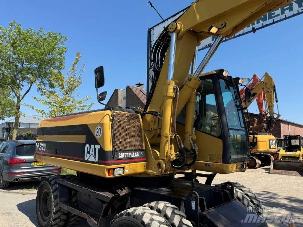 CAT M320 2001 Escavadoras de rodas
