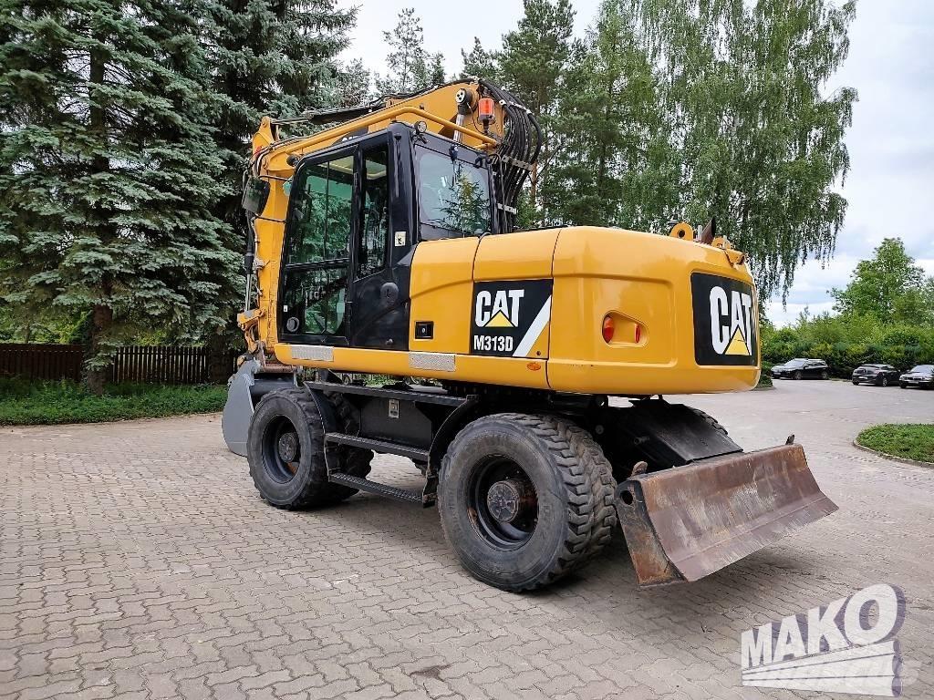 CAT M 313 D Escavadoras de rodas
