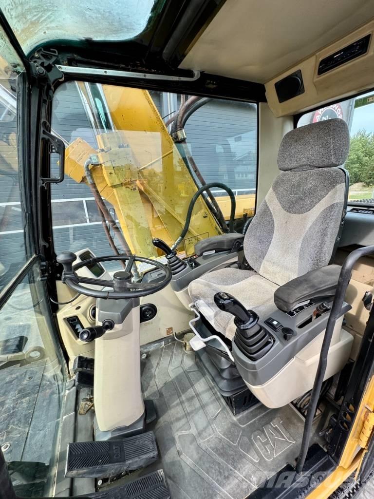CAT M 318 C Escavadoras de rodas
