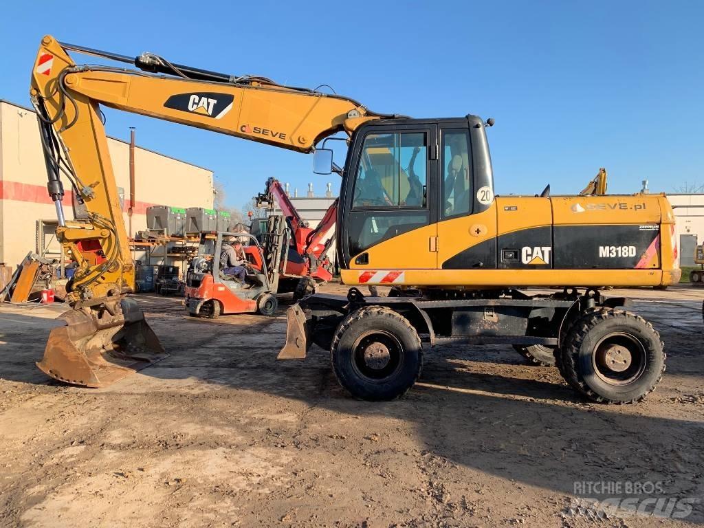 CAT M 318 D Escavadoras de rodas