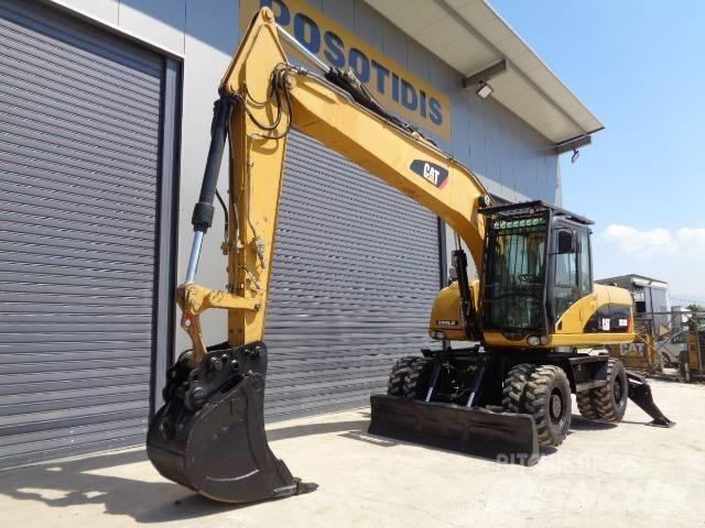 CAT M 318 D Escavadoras de rodas