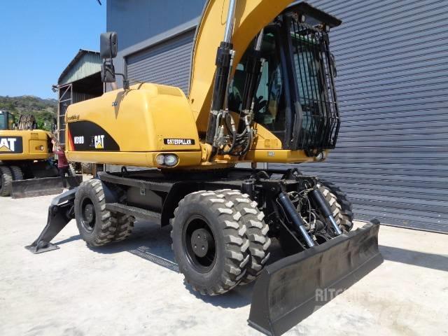 CAT M 318 D Escavadoras de rodas