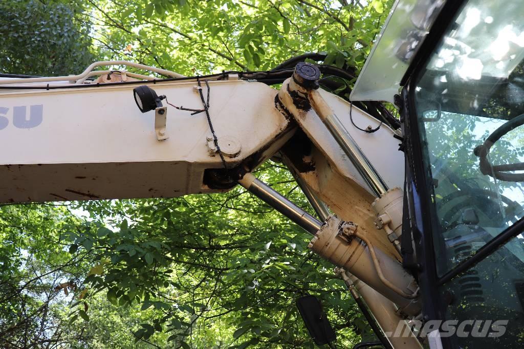 Komatsu PW 140-7 Retroescavadoras