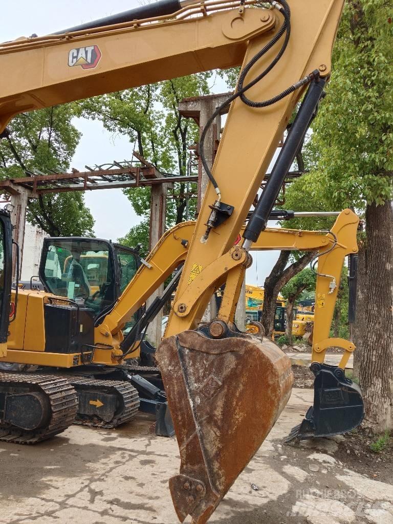 CAT 310 Escavadoras de rastos