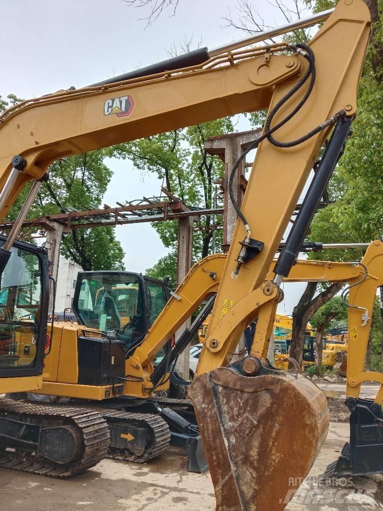 CAT 310 Escavadoras de rastos