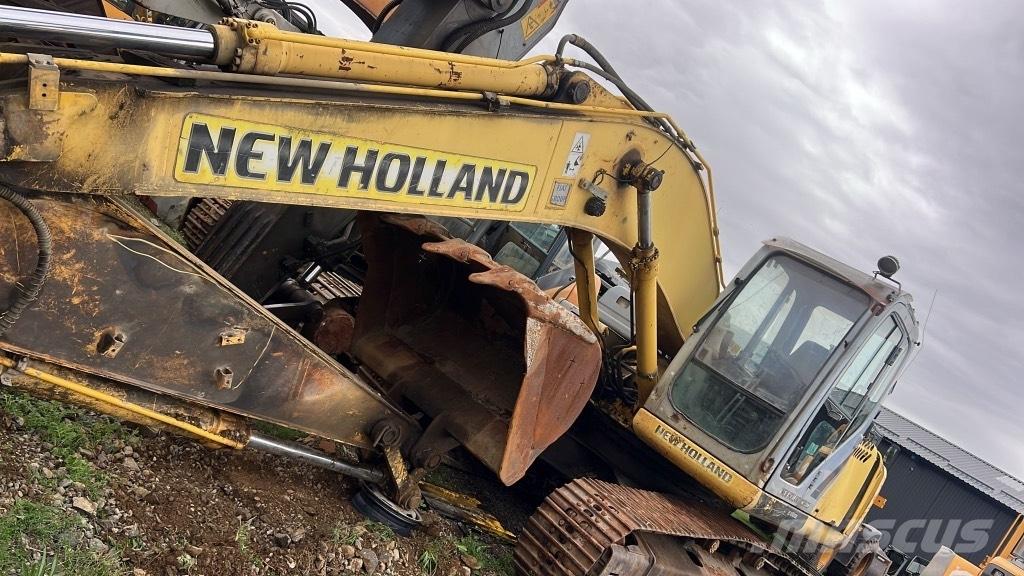New Holland E 215 B Travőes