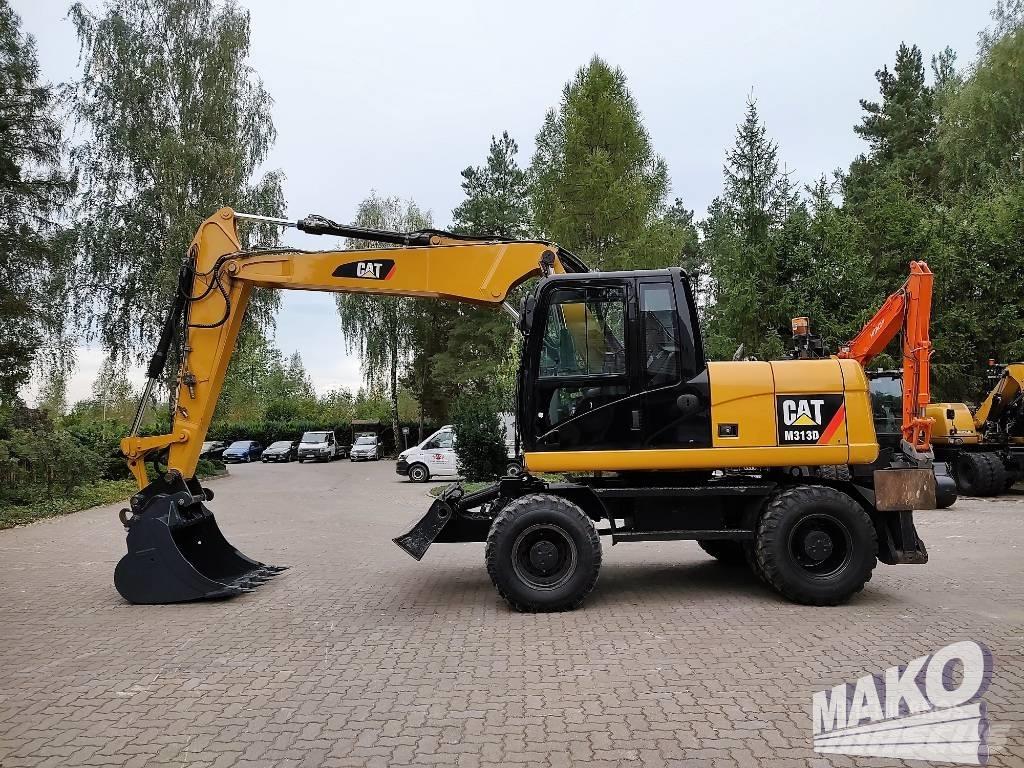 CAT M 313 D Escavadoras de rodas