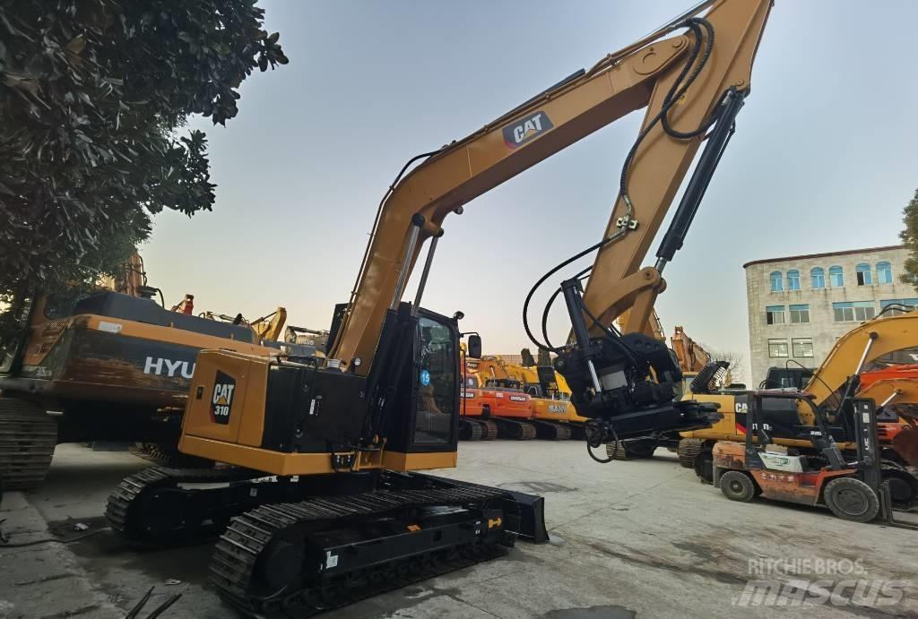 CAT 310 Escavadoras de rastos