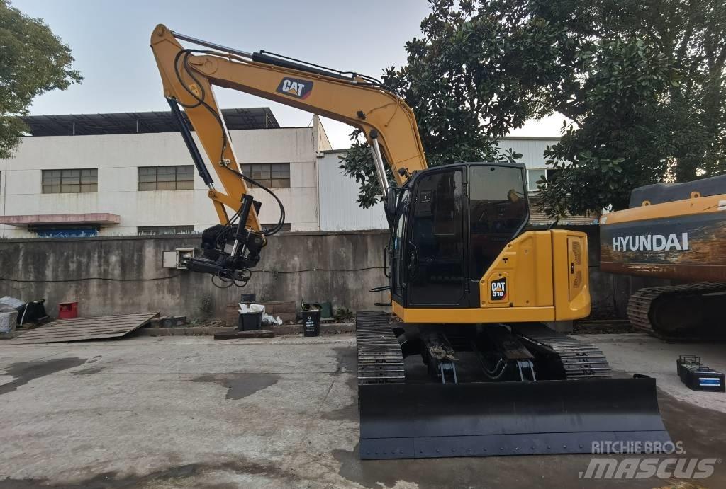 CAT 310 Escavadoras de rastos