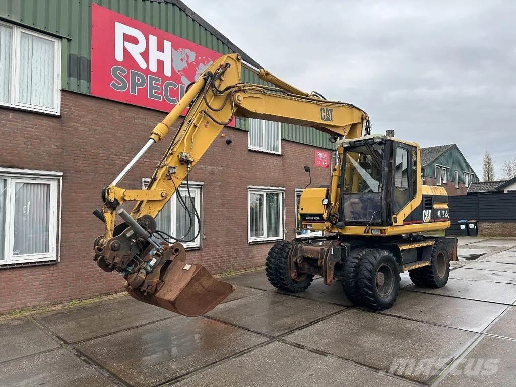 CAT M315 +ROTO CE Escavadoras de rodas