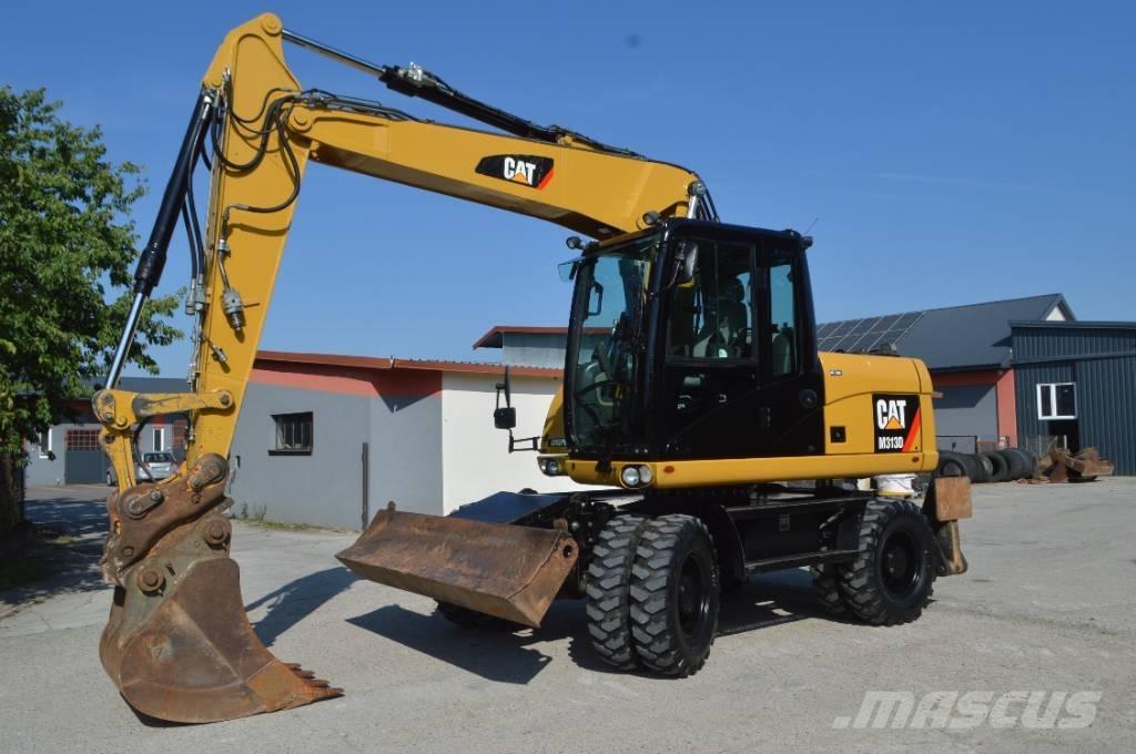 CAT M 313 D Escavadoras de rodas