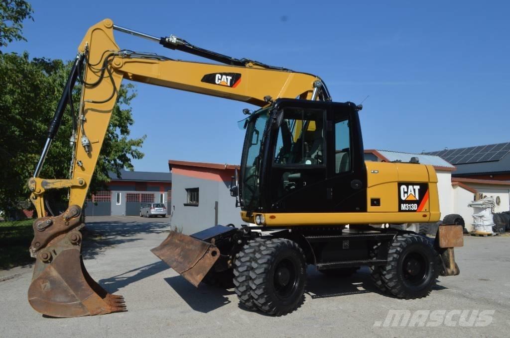 CAT M 313 D Escavadoras de rodas